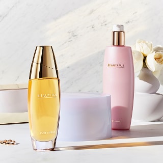 photo of estee lauder fragrance products for layering 