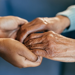 photo of holding hands power of touch for longevity benefits