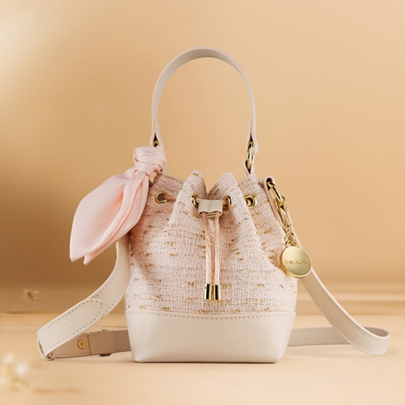Free Bag with $130 Glimmer Purchase*